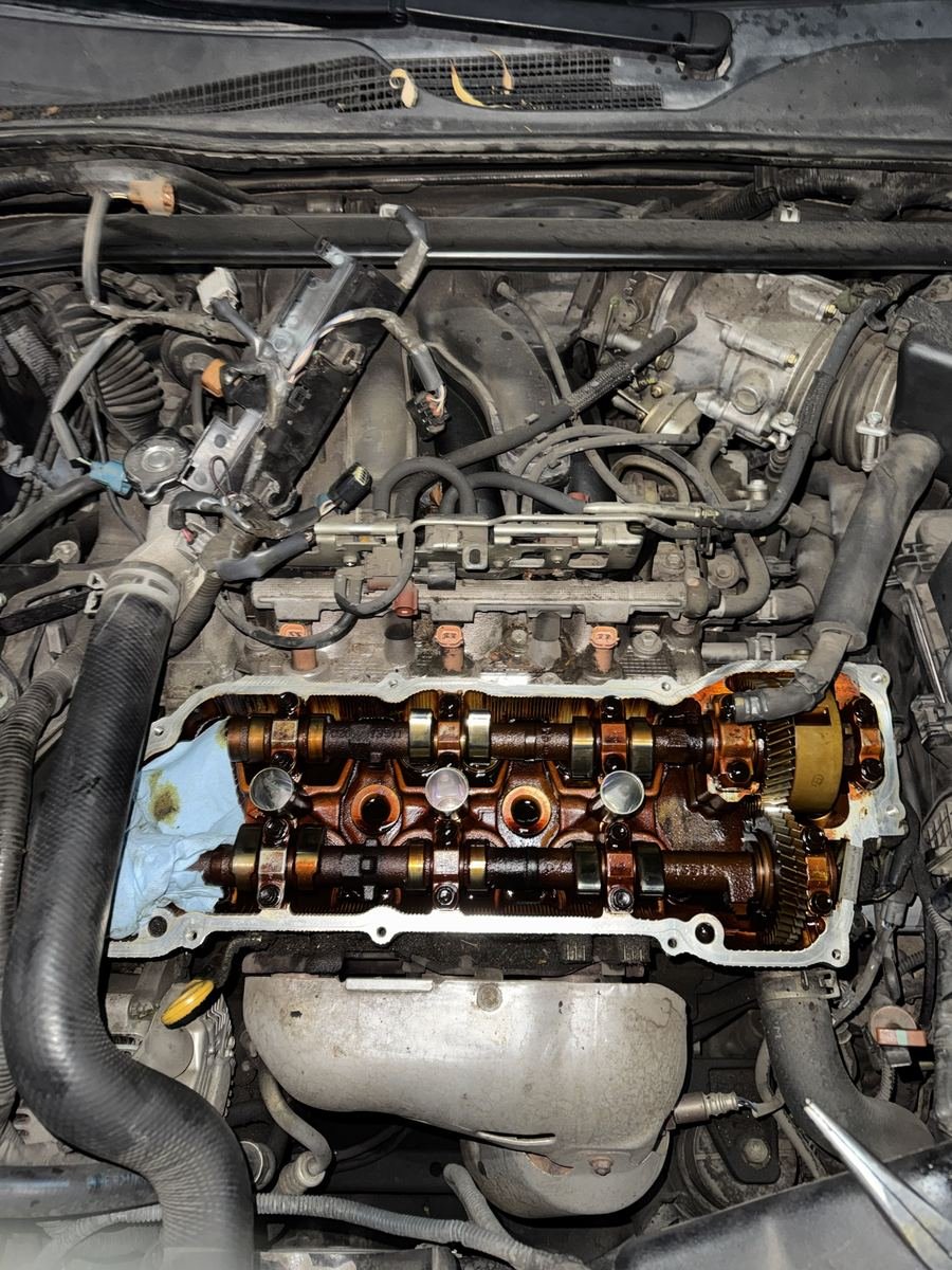 Engine with the valve cover off showing the camshafts